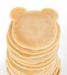 Stack of mini pancake isolated on white
