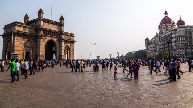 People visiting the Gateway of India in front of The Taj Mahal Palace time lapse