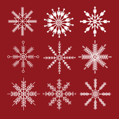 Fototapeta na wymiar snowflake winter set of white isolated silhouette on red background.