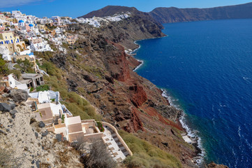 Fototapeta na wymiar White city on the mountain on the Santorini island in Greece