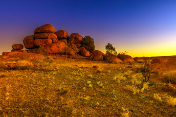 Devils Marbles rock formations at twilight. Australian outback landscape Karlu Karlu - Devils...