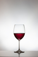 Glasses with red liquid