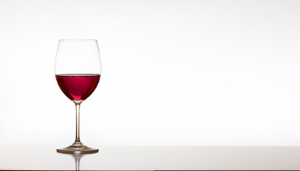 Glasses with red liquid
