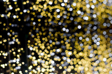 Christmas background with bokeh defocused lights.