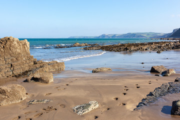 Buck's Mills beach in North Devon, England. The gap in the rocks was man made and called 