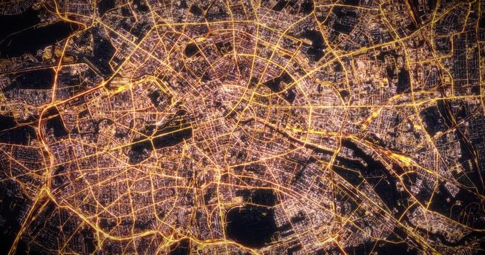 Aerial night view of city of Berlin. Traffic and street light glowing. Camera flying high above, moving higher away and rotating from space filming cinematic straight down. 3d animation rendering.