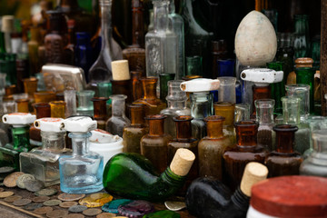 selective focus, colored glass bottles from perfume