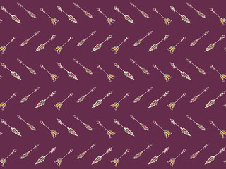 862Seamless pattern of drawn ethnic arrows on a purple background. Vector.