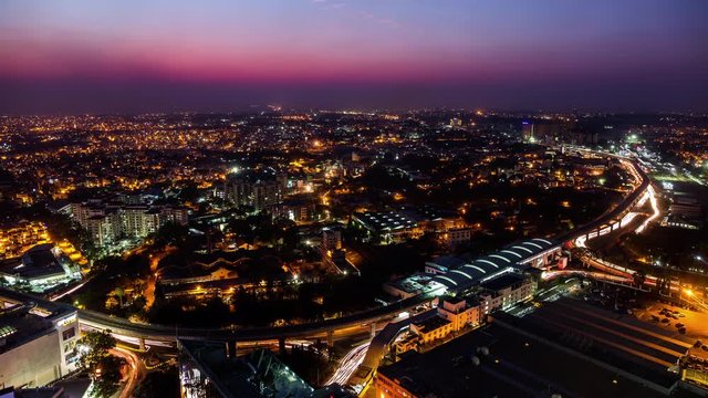 High angle view on Sandal Soap Factory metro station and Yeswanthpur industrial park day to night time lapse