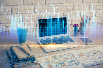 Multi exposure of graph and financial info and work space with computer background. Concept of...