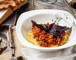pasta with chopped meat and basil
