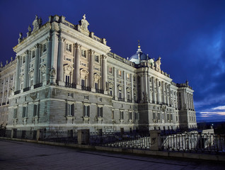 Fototapeta premium North facade of the Royal Palace (Palacio Real) of Madrid at nightfall. View from Plaza de Oriente Square. Madrid, Spain.