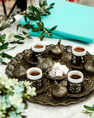 a turkish coffee set with lokums