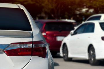 Luxury of white car stop on the asphalt road. 