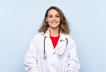 Young blonde woman with doctor gown