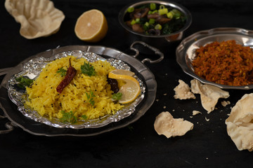 Indian lrmon rice, coconut carrot curry  and mushroom spinach curry