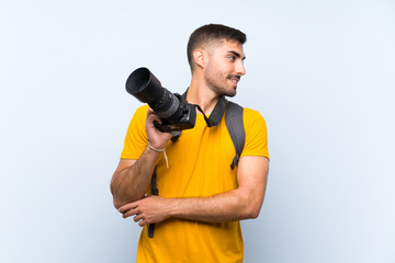 Young photographer man looking to the side