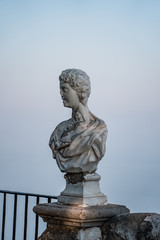 Obraz premium Historic statue in sunset at terrace of infinity, Villa Cimbrone, in Ravello, on top of Amalfi coast, Italy