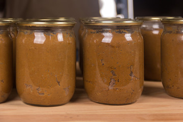 Cans of canned food are on the table. Photo recipe
