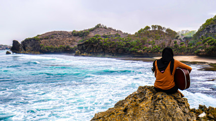 A beautiful beach with white sand and pleasant waves