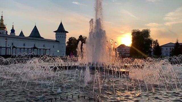 Kazan historic buildings scenic view at sunset, fountains operating in slow motion, tc01