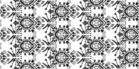 Ikat pattern etnic indian ornamental black and white illustration. Navajo motif texture ornate  design for surface print.