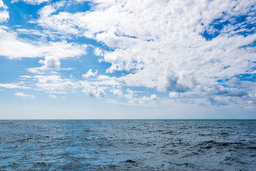 Obraz premium Clouds over the sea