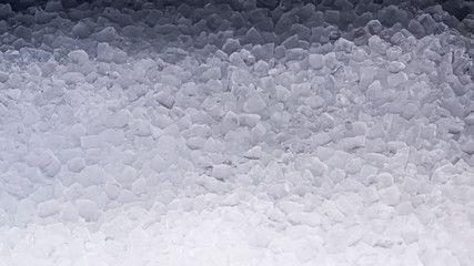 Crushed ice cubes foreground for beverages, beer, whisky, fruit juice, milk, fresh food or fresh vegetables. Summer fresh idea background . clean drink . healthy food background