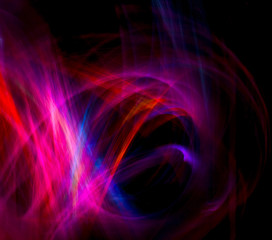 Random lines of pink fairy lights in a stream of color, loops and swirls against a black background.