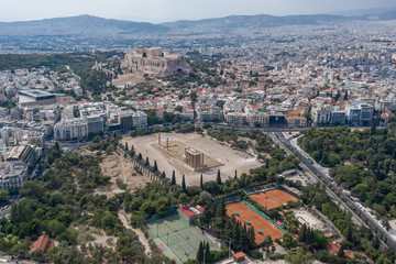 Fototapeta na wymiar Aerial drone shot of Acropoli of Athens, museum and Zeus Olympion Temple collumn ruins