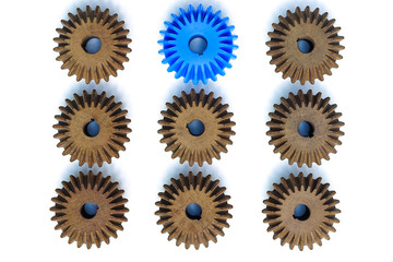 The blue Bevel Gears stand out from the many brown crowd on a white background. Leadership,...