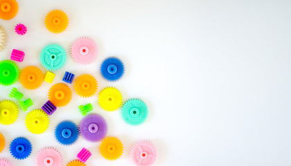 Colorful gears on a white background ,concept of work process movement gears