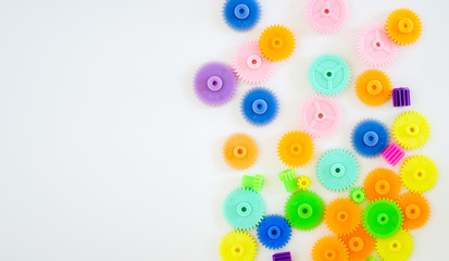 Colorful gears on a white background ,concept of work process movement gears