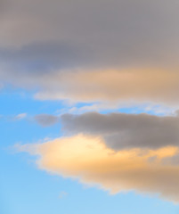 Dramatic puffy clouds at sunset