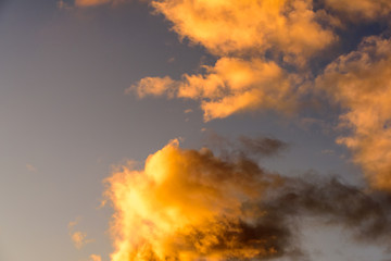 Dramatic puffy clouds at sunset