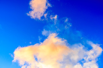 Dramatic puffy clouds at sunset
