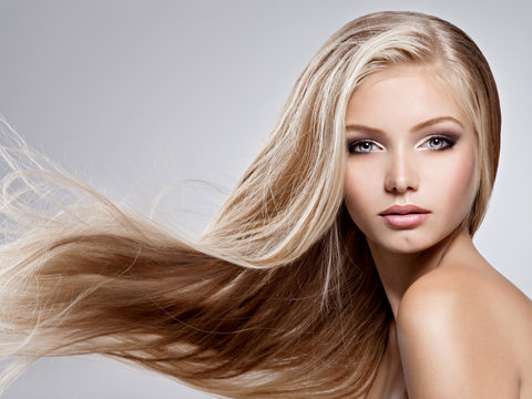 Fototapeta Beautiful young woman with long straight white hair