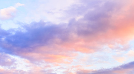 Dramatic puffy clouds at sunset