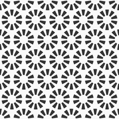 Abstract seamless pattern of repeating round ornaments isolated on white background.