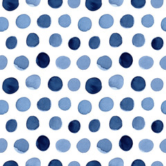 Hand-drawn watercolor seamless polka dot pattern in shades of indigo blue.