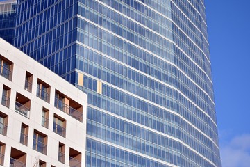 Fragment of modern residential apartment with flat buildings exterior. Detail of new luxury house and home complex. 