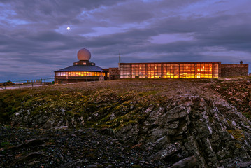 The North Cape Hall in in touristic Nirdkapp area as seen after the midnight in the mis of August from the Globe monument. Finnmark, Norway © sasha64f