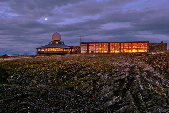 The North Cape Hall in in touristic Nirdkapp area as seen after the midnight in the mis of August from the Globe monument. Finnmark, Norway