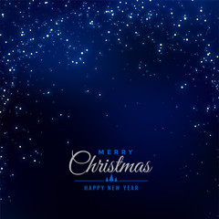 Obraz na płótnie Canvas merry christmas blue background with falling sparkles