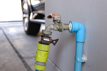 The leaky faucet Water drop from the leak faucet