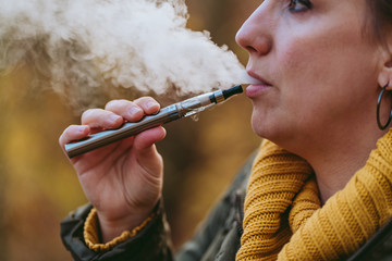 woman with cigarette in hand