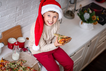 kids eat pizza in the kitchen