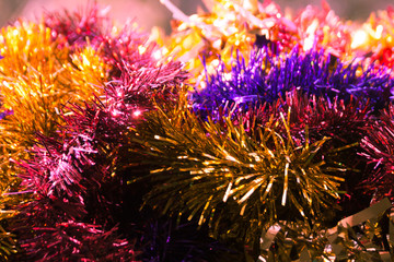 Multi colored Christmas tinsel background