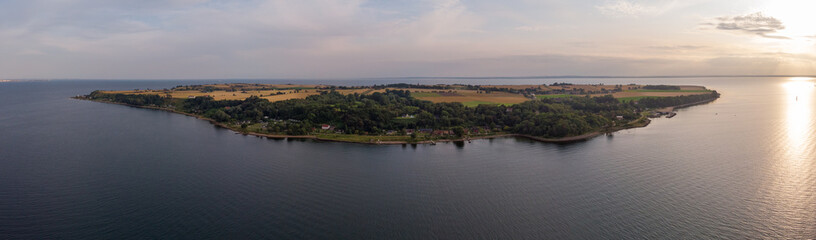 Fototapeta premium Aerial view of the island Ven in southern Sweden during a summer sunset. 