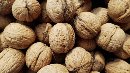 many walnuts as background